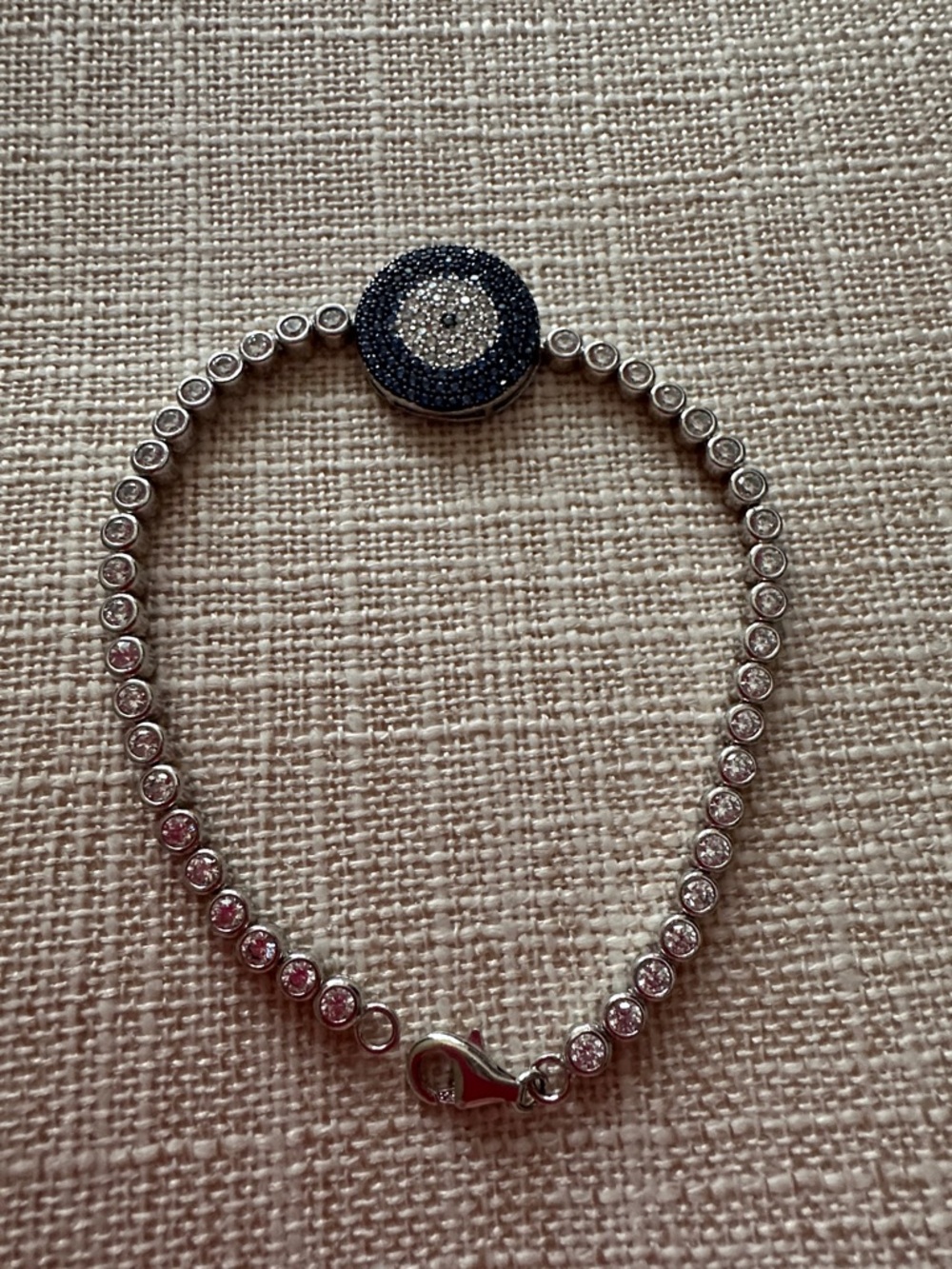 Silver Tennis Bracelet with Blue Pave Evil Eye Accent